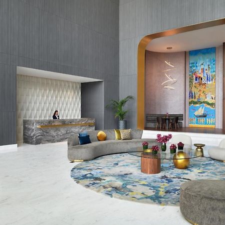 דובאי Movenpick Jumeirah Village Triangle מראה חיצוני תמונה The lobby of the hotel