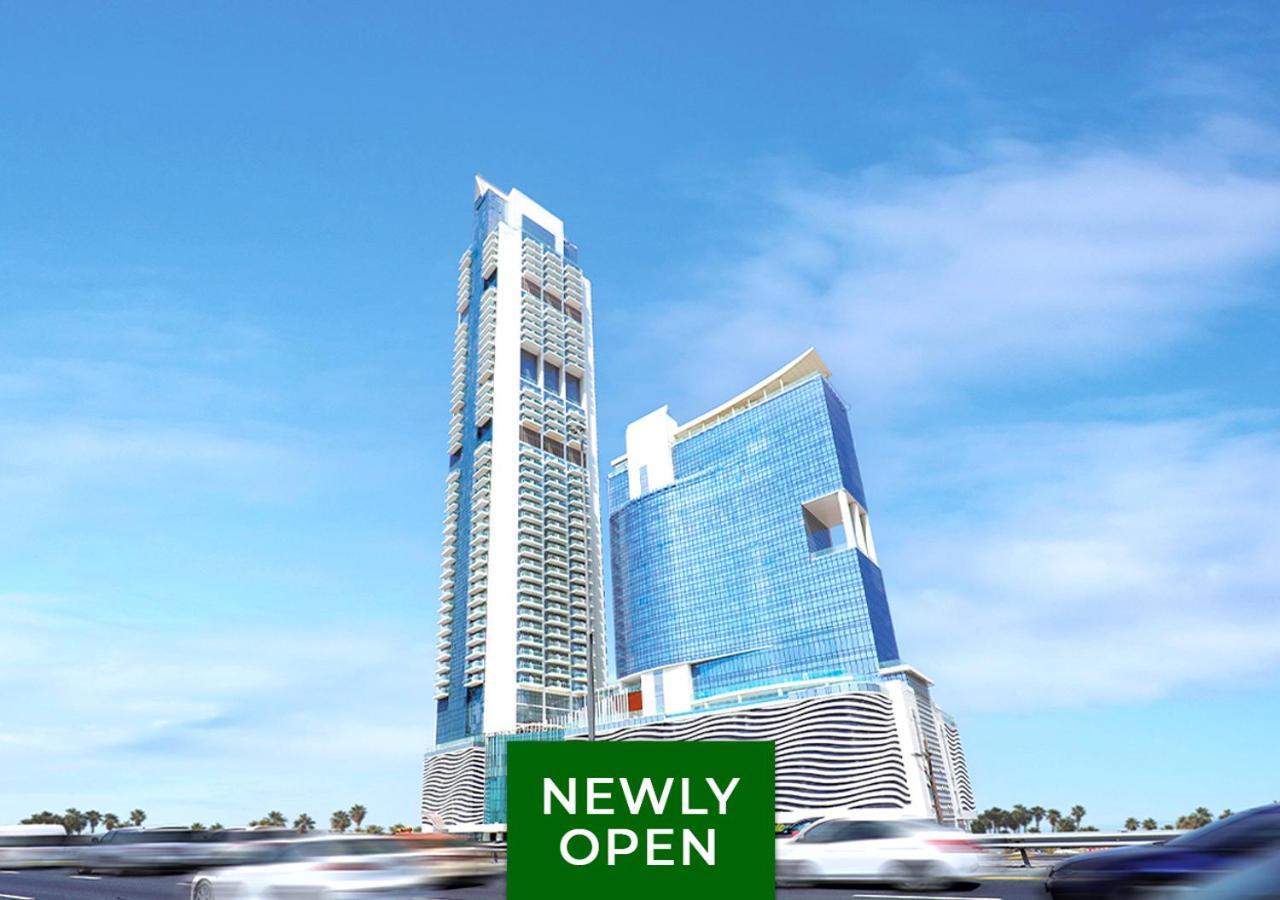 דובאי Movenpick Jumeirah Village Triangle מראה חיצוני תמונה The 101 Tower