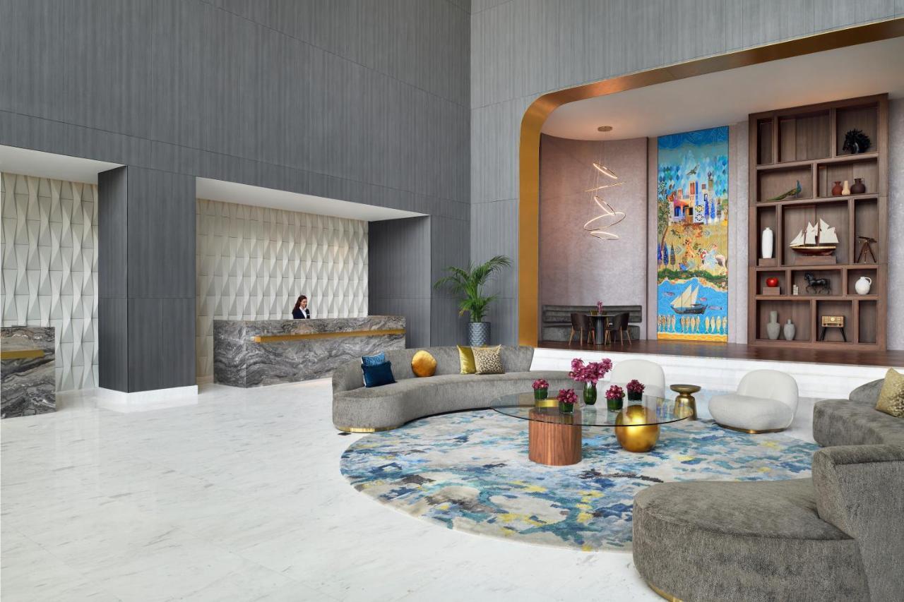 דובאי Movenpick Jumeirah Village Triangle מראה חיצוני תמונה The lobby of the hotel